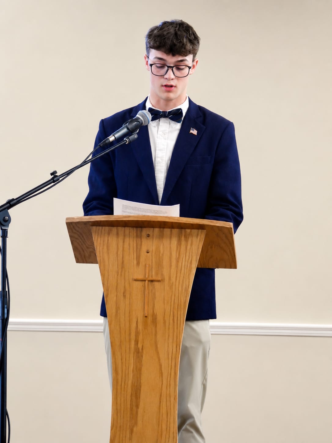 A Geneva Academy rhetoric student delivering an address from the podium