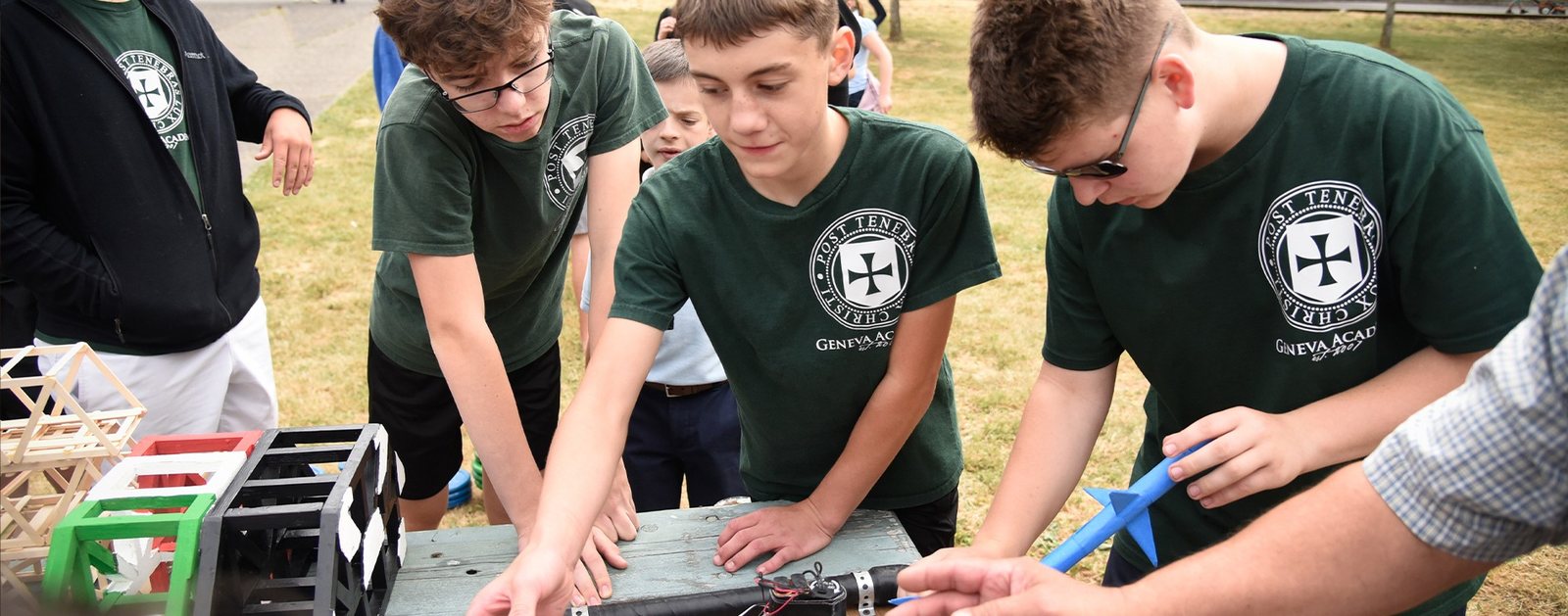 Geneva Academy students building and launching model rockets in Roseburg, Oregon
